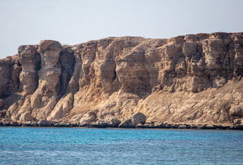 Fototapeta na wymiar Rocky coast of an island in the Red Sea