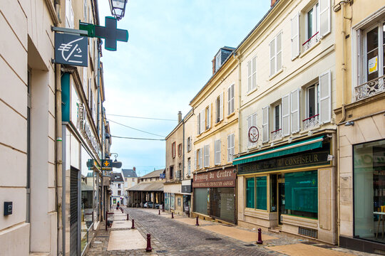 Dourdan, FRANCE - August 14, 2022: Street view of downtown Dourdan, France