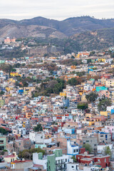 Very beautiful view of the city at sunset in the Mexican city of Guanajuato surrounded by large mountains.