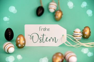 Fototapeta na wymiar Golden Easter Egg Decoration. Label With Frohe Ostern Means Happy Easter