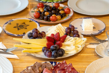 Ramadan table. The sahur table with cheese varieties, salami, pastrami, roasting, olives and tea