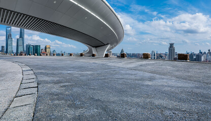 Concrete road and bridge with city skyline in Shanghai, China.