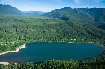 Beautiful lake surrounded by green forest
