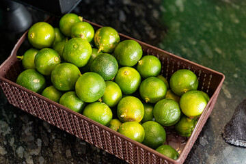 limes in a basket