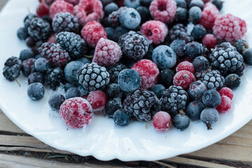 Frozen berries in a bowl, close-up