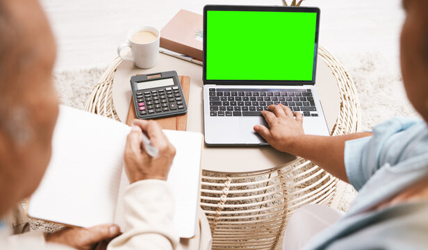 Green Screen, Home Finance And Laptop Of Senior Couple Planning Budget, Banking Online And Asset Management. People On Computer With Financial Strategy, Loan Or Investment On Mockup Space For Website