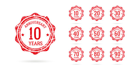 Set of anniversary logos from 10 to 90 years old, drawn as stamps, red celebration frames. Grunge style rubber stamp texture. Postage stamp collection. Vector round stamps for holiday event