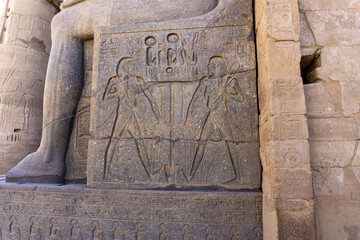 Interior walls of the Luxor temple, with hieroglyphs and columns