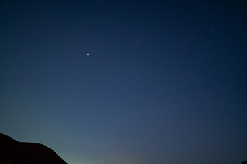 Starry sky in the Hurghada desert, with a mountain