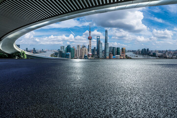 Fototapeta na wymiar Asphalt road and bridge with city skyline scenery in Shanghai, China.