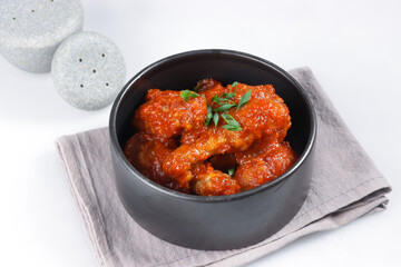 Ayam Masak Merah or Chicken Cooked  in Dried Chillies Sambal is a Malay Traditional Dish.