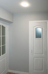 room after renovation, laminate and clean walls, restrained color of modern style and design