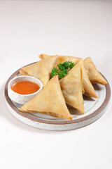 Samosa filled with potatoes and meat curry.