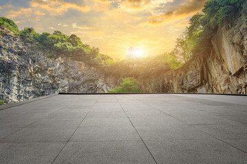 Empty square floor and mountain with sky clouds background at sunset