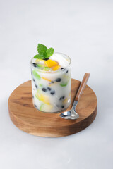 Es Buah or Sop Buah is Mixed Fruit and Jelly with Coconut Water Served with Shaved Ice and Condensed Milk. Es Campur.