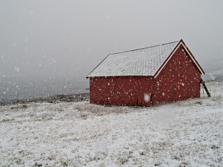 Boatshed/barn in falling snow