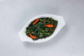 Kangkung Goreng Belacan is a Malaysian Homedish, Fried Water Spinach with Shrimp Paste.
