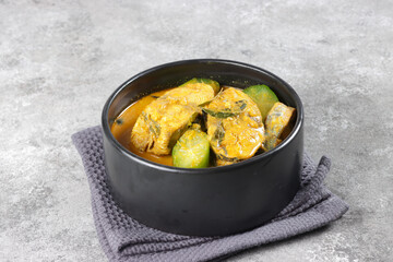 Kari Ikan Belimbing Buluh is a Traditional Dish from Malaysia, Fish Curry with Bilimbi or Cucumber Tree.