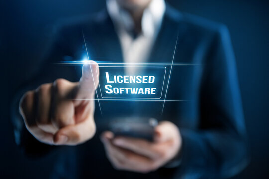 Licensed software concept. Businessman uses licensed software