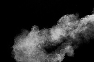 White talcume powder explosion on black background. White dust particles splash.