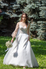 Fototapeta na wymiar Portrait of a girl in a wedding dress