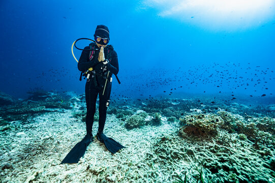diver performing Thai Greeting in the Gulf of Thailand