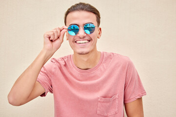 Man, face and retro fashion sunglasses on isolated background for marketing branding, optometry...