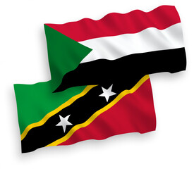 Flags of Federation of Saint Christopher and Nevis and Sudan on a white background