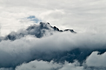 Mountains in Northern Norway embraced in clouds