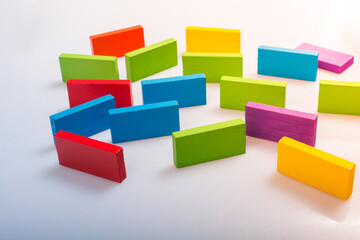 Colorful domino blocks on white background