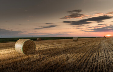 Stubble field and hay bales © Dusan Kostic