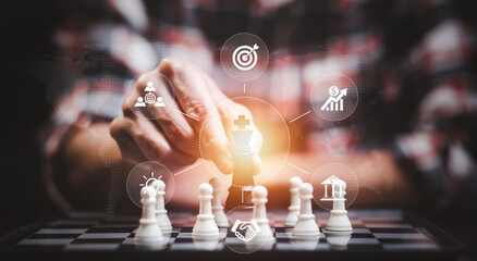 Business strategy competitive ideas concept, Chess game on chess board behind business background....