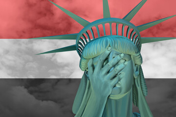 Statue of Liberty. Facepalm emoji on background in colors of Yemen flag