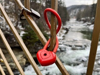 red heart on a fence