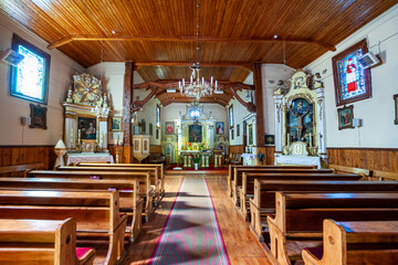 Fototapeta na wymiar Wooden Church of St. Mary Magdalene in Łęgonice Małe, Masovian Voivodeship, Poland