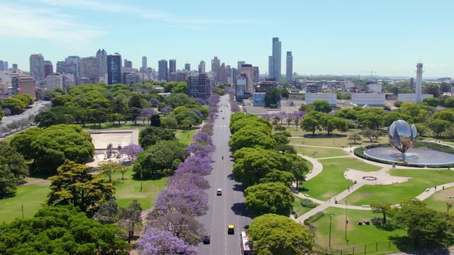 Aerial View Of Traffic In The Road Along The United Nations Park With Floralis Generica Sculpture In Buenos Aires, Argentina.