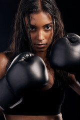 Boxing, gloves and portrait of woman on black background for sports, strong focus or mma training....