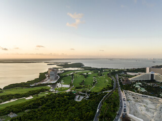 Aerial view of the beautiful coastline of Cancun, Mexico. Hotel zone. Sunset. Panorama.