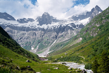 Fototapeta na wymiar Travel by Switzerland. Beautifl summer landscape. River in Alps Mountains.