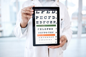Hands, tablet screen and optometry chart in hospital for vision examination in clinic. Healthcare, snellen or woman, ophthalmologist or medical doctor holding technology showing letters for eye test.