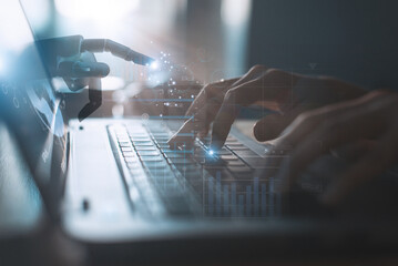 Through a holographic interface, the concept of artificial intelligence connects to business and industrial control with robot hands and human touch to learn from intelligence.