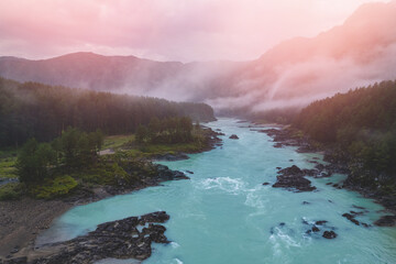 Evening landscape Altai mountains summer Russia, aerial top view. Blue Katun river with fog