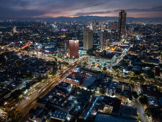 Fototapeta na wymiar Beautiful aerial view of the capital of Mexico city at night.