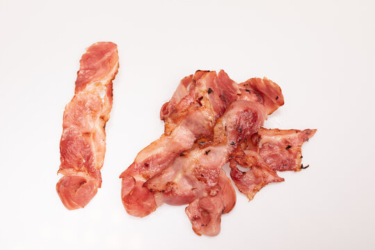 It is a processed meat made from the belly or flank of pork.