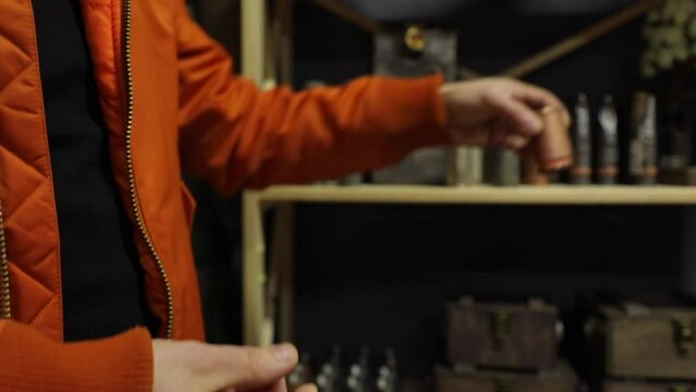 Cups for alcohol are made from the casings of a large-caliber machine gun