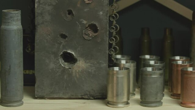 Cups for alcohol are made from the casings of a large-caliber machine gun