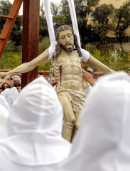 Holy Week in Zamora, Spain. The articulated Christ is taken down from the cross in the procession of the holy burial in Bercianos of Aliste. - obrazy, fototapety, plakaty