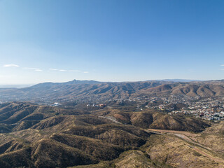 A beautiful aerial view of the endless mountains around the Mexican city of Guanajuato at sunset.