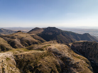 A beautiful aerial view of the endless mountains around the Mexican city of Guanajuato at sunset.