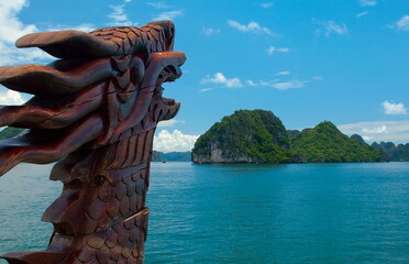 Figure of wood Dragon on Beautiful sea gulf  Ha long bay surrounded high mountains